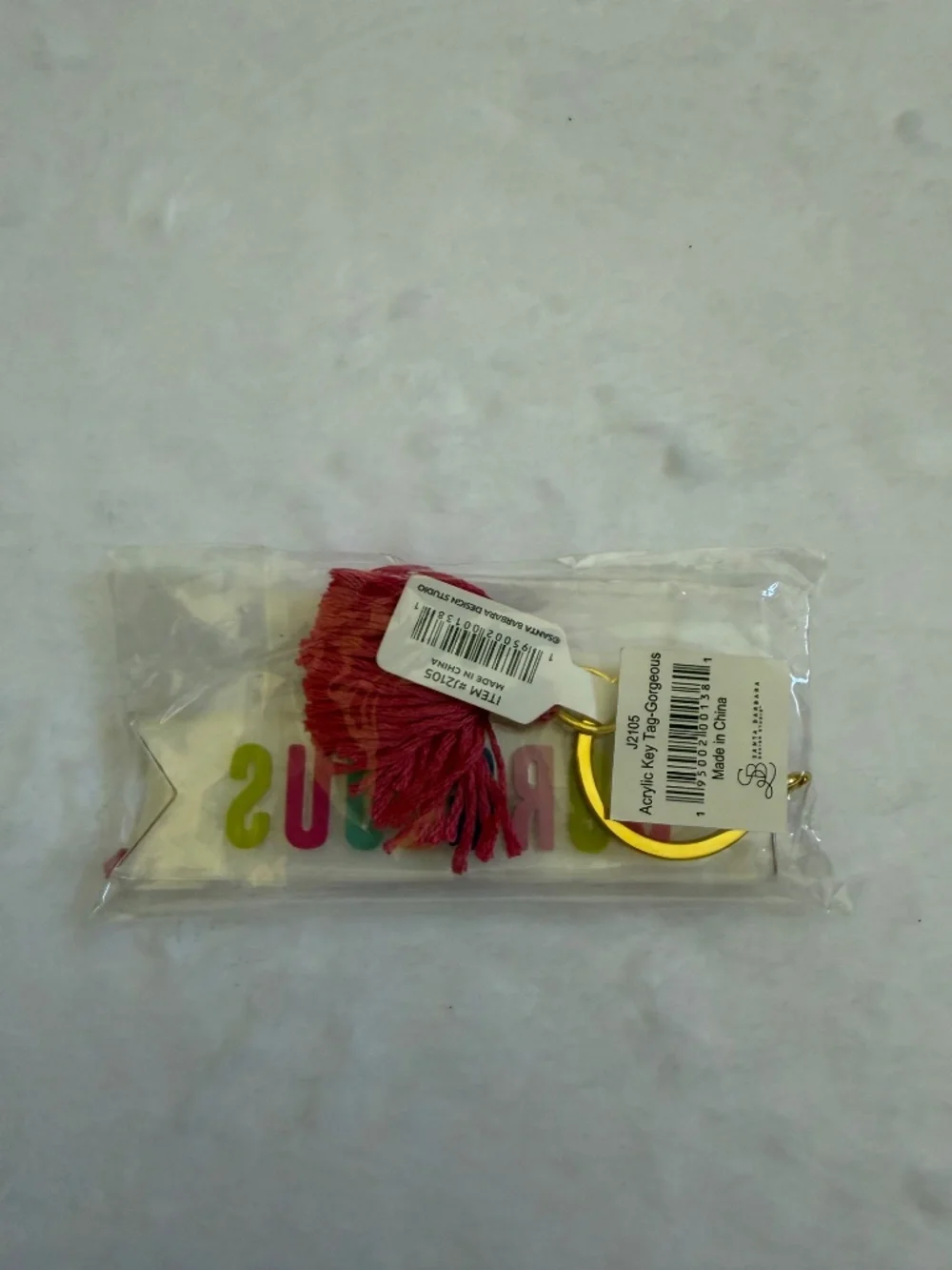 Santa Barbara Design Studio “Gorgeous” Acrylic Multicolor Keychain Pink Tassel